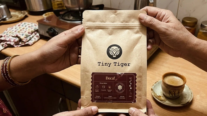 Reading the label on a bag of decaf coffee before buying
